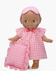 Minikane - Maia at home in her pink checkered nightgown