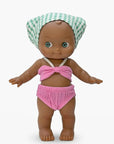Minikane - Prunelle at the beach in her candy pink outfit