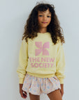 The new society - tns logo sweatshirt - soft lemon