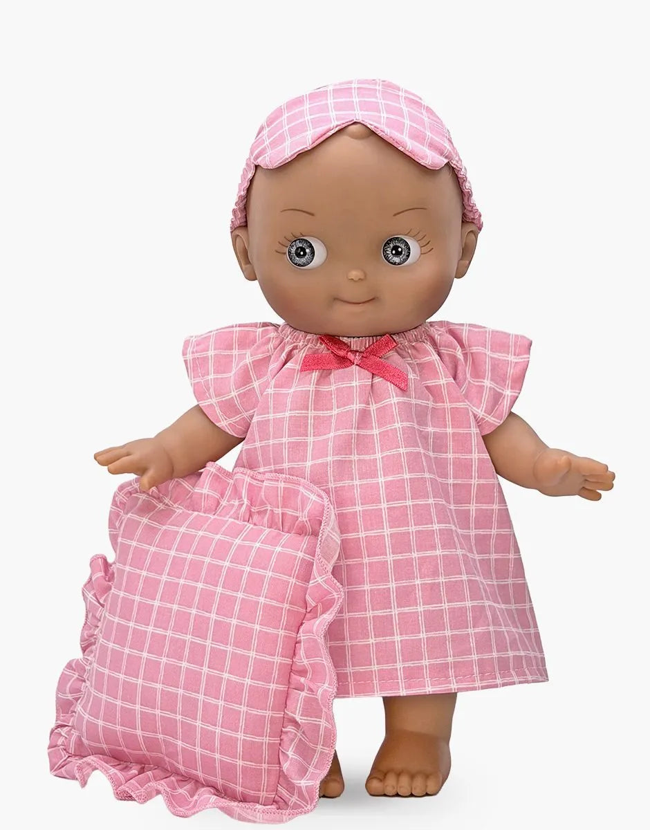 Minikane - Maia at home in her pink checkered nightgown