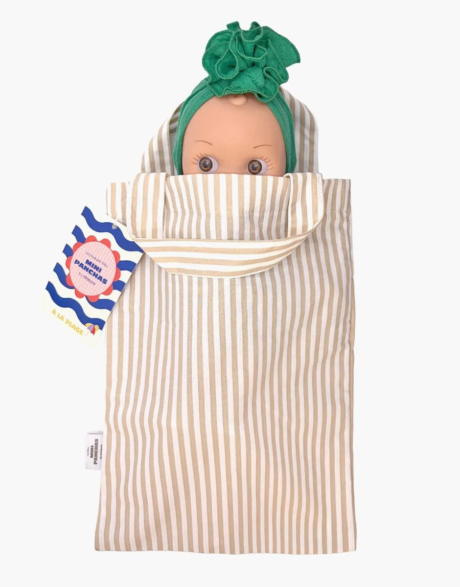 Minikane - Ninon at the beach in her blue striped outfit