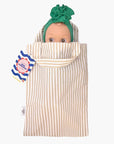 Minikane - Ninon at the beach in her blue striped outfit