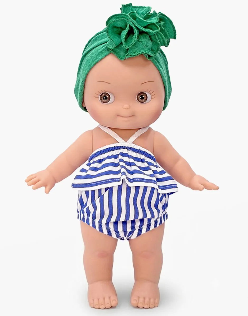 Minikane - Ninon at the beach in her blue striped outfit