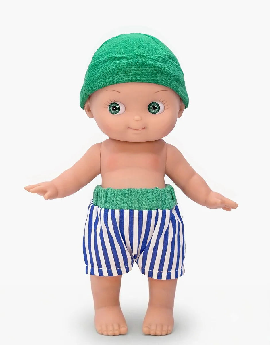 Minikane - Zebulon at the beach in his blue striped outfit