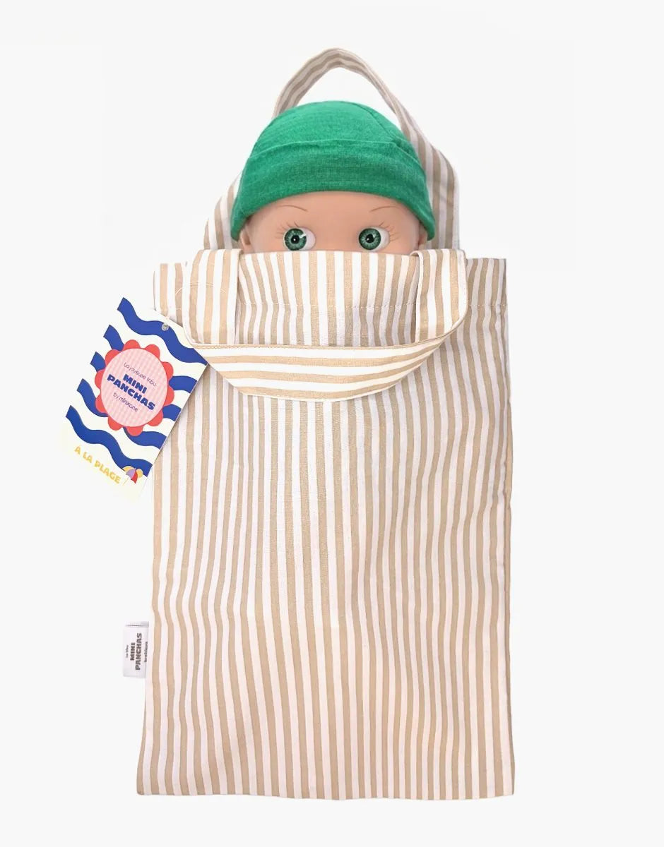 Minikane - Zebulon at the beach in his blue striped outfit