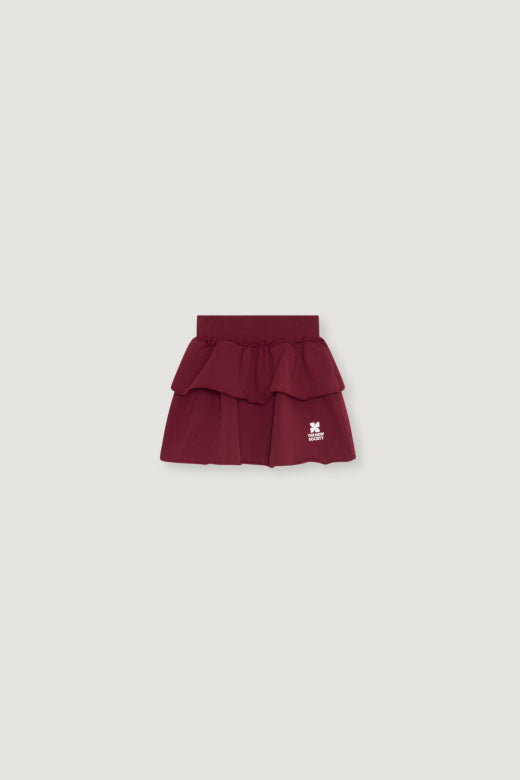 The New Society - TNS logo skirt - rumba red