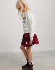 The New Society - TNS logo skirt - rumba red