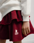 The New Society - TNS logo skirt - rumba red